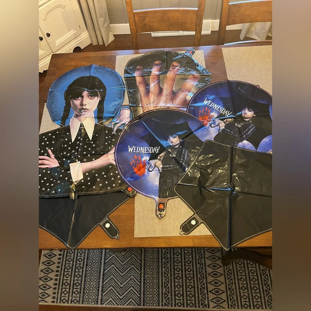 New! ‎ Wednesday Adam’s foil balloons.